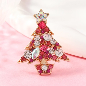 Sparkling Christmas tree brooch with colorful rhinestones on a gold alloy base