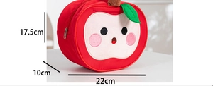Detailed view of red apple gift bag with cute cartoon embroidery and dimension markings