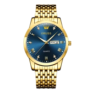 Detail of gold quartz watch with blue dial, luminous markers and day-date display