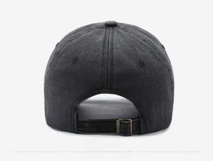 Detail of vintage washed baseball cap back with adjustable bronze metal buckle