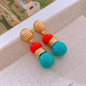 Vintage round faux stone drop earrings with gold metal beads and turquoise texture