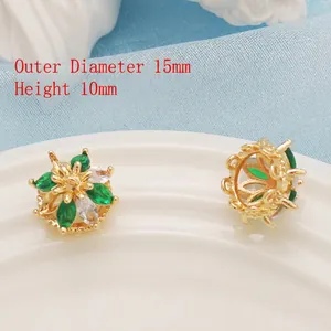 Detail of 14K gold plated floral pendant with zircon inlay showing 15mm outer diameter size