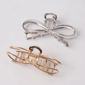 Elegant gold and silver alloy butterfly hair claws in a geometric Korean minimalist style