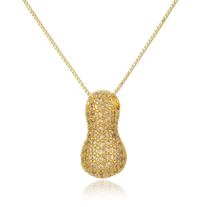 Macro shot of gold-plated peanut pendant necklace featuring brown rhinestones on white background