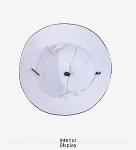 Detail view of the sun hat interior with adjustable white drawstring and plastic buckle