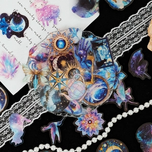 Detailed view of waterproof galaxy pet stickers featuring moon, stars, and cats