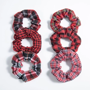 Set of 6 plaid fabric scrunchies in red and black vintage patterns on white background