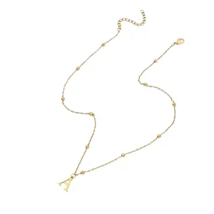 Minimalist gold beaded chain necklace with polished capital A letter pendant