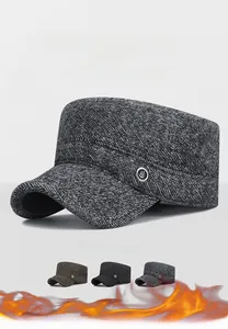 Detailed close-up of geometric textured winter military caps with earmuffs in three colors