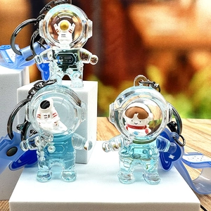 Blue astronaut liquid quicksand keychain in transparent bottle for bags and keys