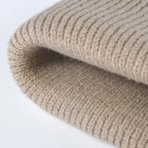 Thick ribbed knit beanie hat in warm khaki wool blend for winter warmth and outdoor comfort