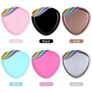 Polished stainless steel irregular jewelry trays in six colors with rainbow stripe detail