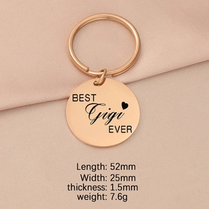 Polished rose gold keychain with circular tag and dimensions of 52mm by 25mm