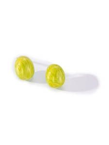 Detailed macro view of oval green marble texture resin earrings with titanium steel studs