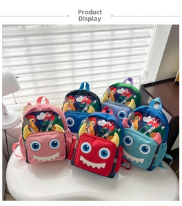 Detailed row of kids cartoon monster backpacks in various colors on a sunlit ledge