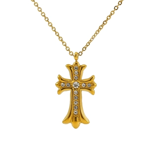 Elegant gold-plated cross pendant necklace with sparkling clear rhinestones on white base