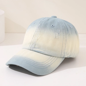 Detailed view of kids baseball cap featuring blue yellow gradient and distressed edges