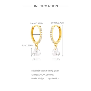Detailed view of silver heart earrings with gold finish and cubic zirconia dimensions