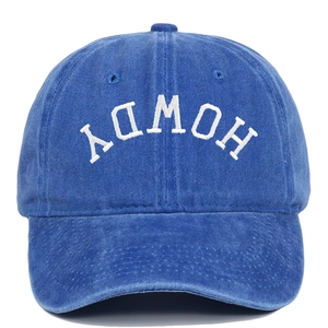 Close-up of Howdy 3D white embroidery on vintage washed cotton denim baseball cap