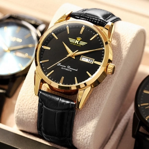 Kinsnuos men's automatic watch with gold stainless steel case and black leather strap