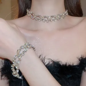 Sparkling crystal flower necklace and bracelet jewelry set for women in silver finish