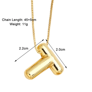 Detail of 18K gold letter T pendant showing dimensions 2.2cm height and 45cm chain length