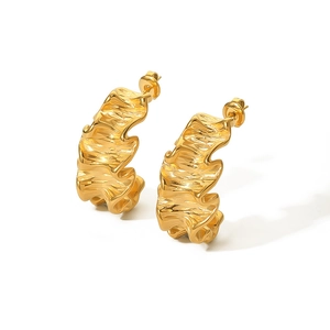 Chic 18K gold plated stainless steel earrings with irregular wavy texture on white background