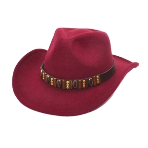 Classic wine red wool felt western cowboy hat with studded leather band on white background