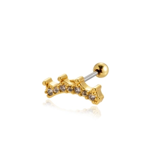 Close-up of golden crown stud earring with sparkling cubic zirconia on white reflective base