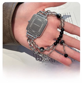 Close-up of 3ATM waterproof stainless steel watch back with stylish beaded chain band