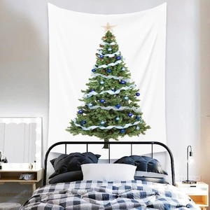 Detail of Christmas tree tapestry hanging on bedroom wall for festive decoration