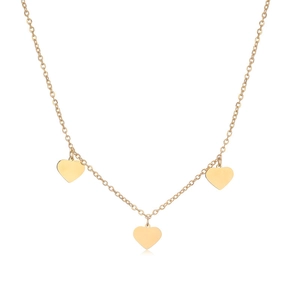 Close-up of golden stainless steel necklace featuring three elegant heart shaped pendants