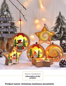 Detail of wooden LED Christmas star and round ornaments with Santa and Snowman designs