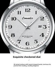 Macro shot of silver automatic watch dial with guilloche texture and date display window