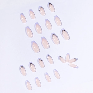 French long coffin press-on nails in lavender and nude pink with rhinestones