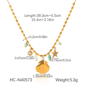 Detail of gold ocean-style necklace with shell charms and size dimensions shown