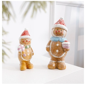 Macro detail of gingerbread man figurines with glitter resin finish and holiday decor