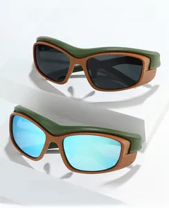 Detail of sports cycling sunglasses with olive green frame and removable side shields