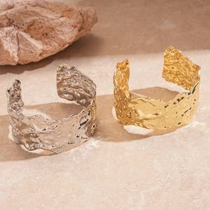 Minimalist hammered texture wide open cuff bracelets in polished gold and silver finishes