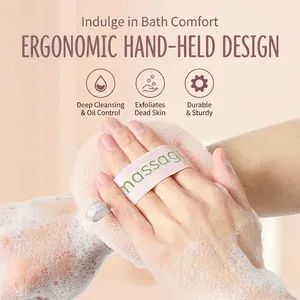 Pink exfoliating shower sponge with massage handle strap generating rich foamy lather