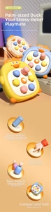 Detail of cute duck whack-a-mole toy in yellow, blue and white with silicone buttons