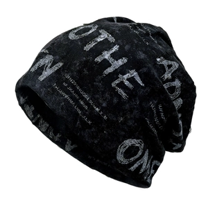 Unisex black knit beanie with white graffiti lettering and street style print