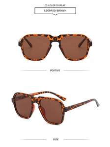Detail view of leopard print aviator sunglasses with brown lenses and double bridge design