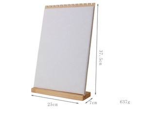 Detailed side view of wooden jewelry display board with white fabric for necklaces