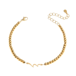 Golden stainless steel beaded bracelet featuring a wave charm and adjustable lobster clasp