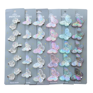 Holographic butterfly and white flower hair clips set for women on display card