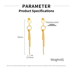 Detail view of 95mm gold-plated stainless steel cross earrings with long fringe tassels