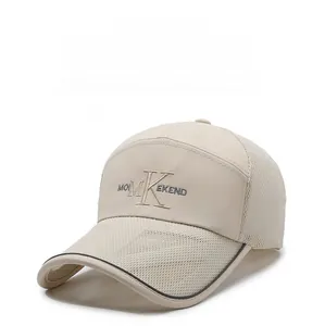 Close-up of beige breathable mesh baseball cap with 3D embroidery and curved brim