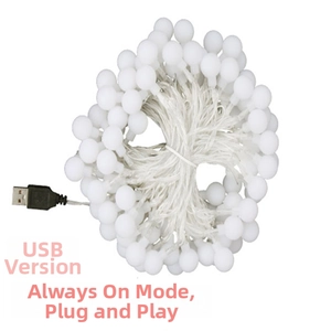 Detail of white frosted LED globe string lights with USB plug and steady-on mode