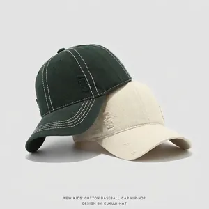 Gorra vintage para niños con costuras en contraste en verde oscuro y beige suave